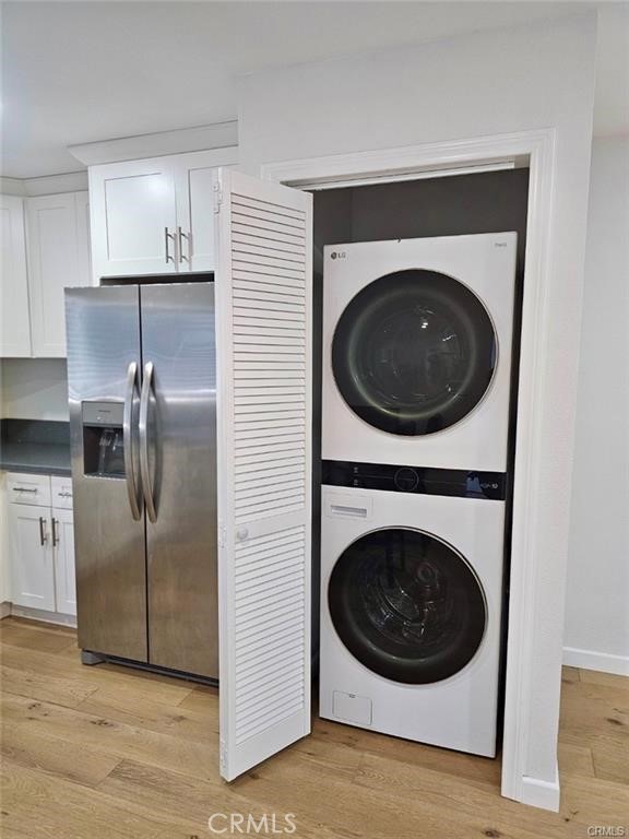 769 East 7th Street, Unit B Upland, CA 91786 - Photo 8 of 12 a kitchen with a washer and dryer