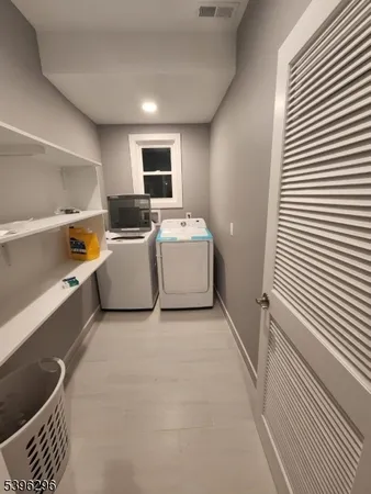 a view of utility room and utility room