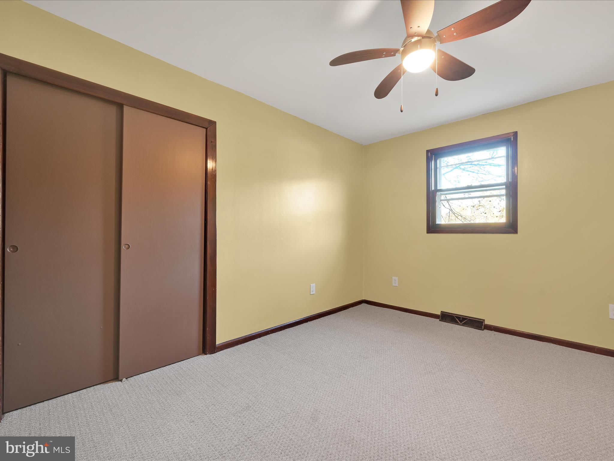 148 Mexico Road Pine Grove, PA 17963 - Photo 19 of 33 an empty room with a window and a fan