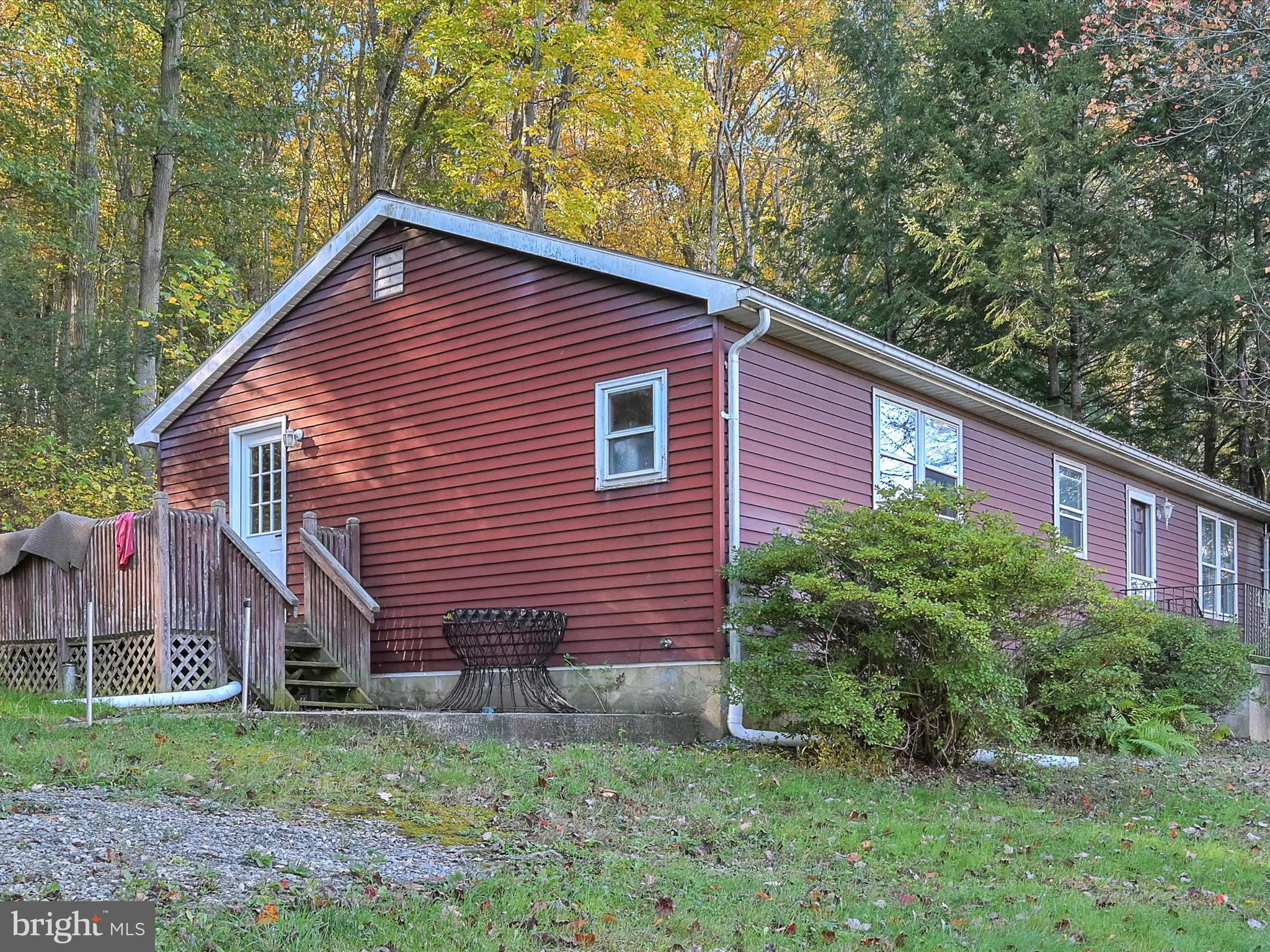 148 Mexico Road Pine Grove, PA 17963 - Photo 25 of 33 a view of a house with a yard plants and large tree