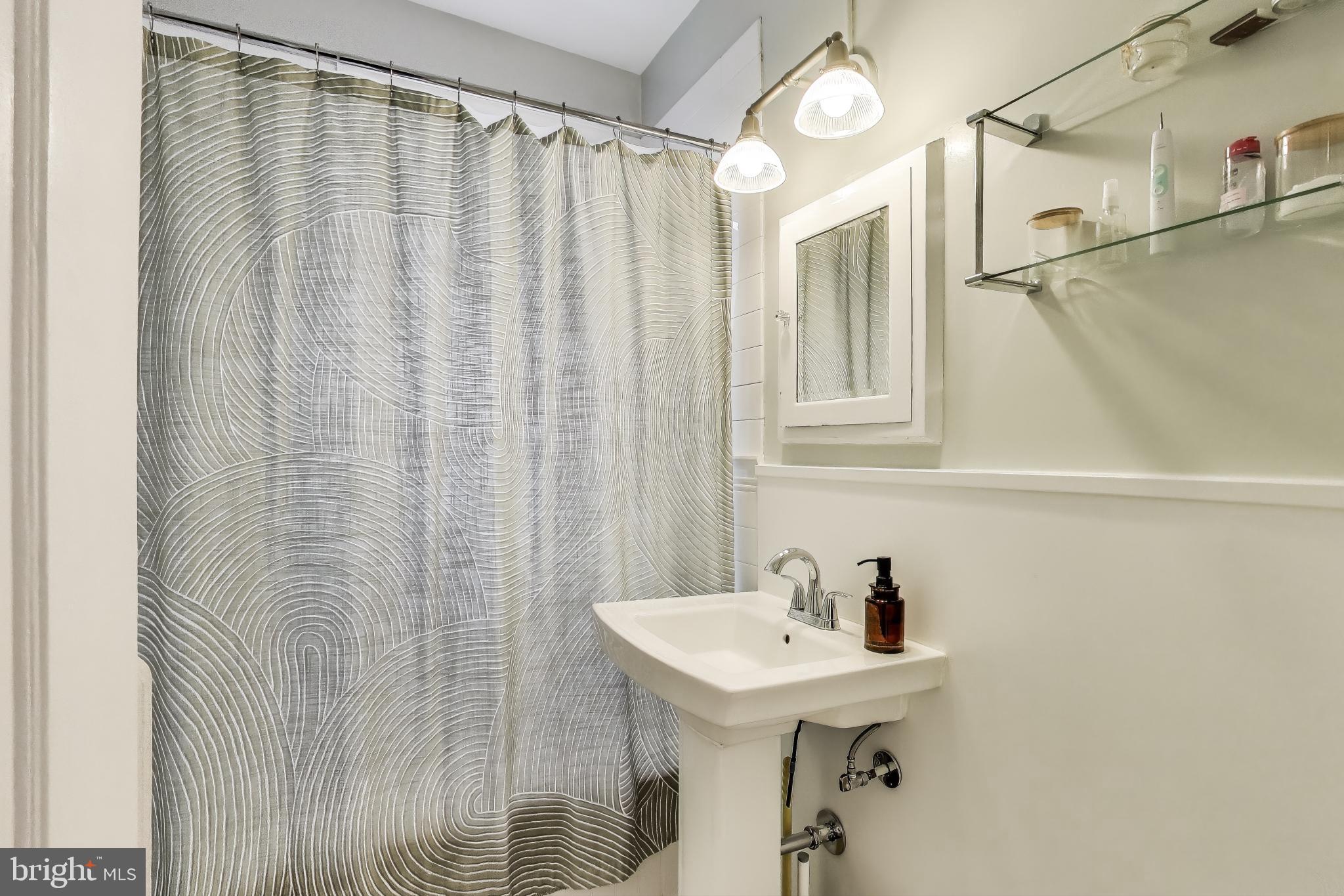 2707 Adams Mill Road Northwest, Unit 206 Washington, DC 20009 - Photo 11 of 18 Updated bath
