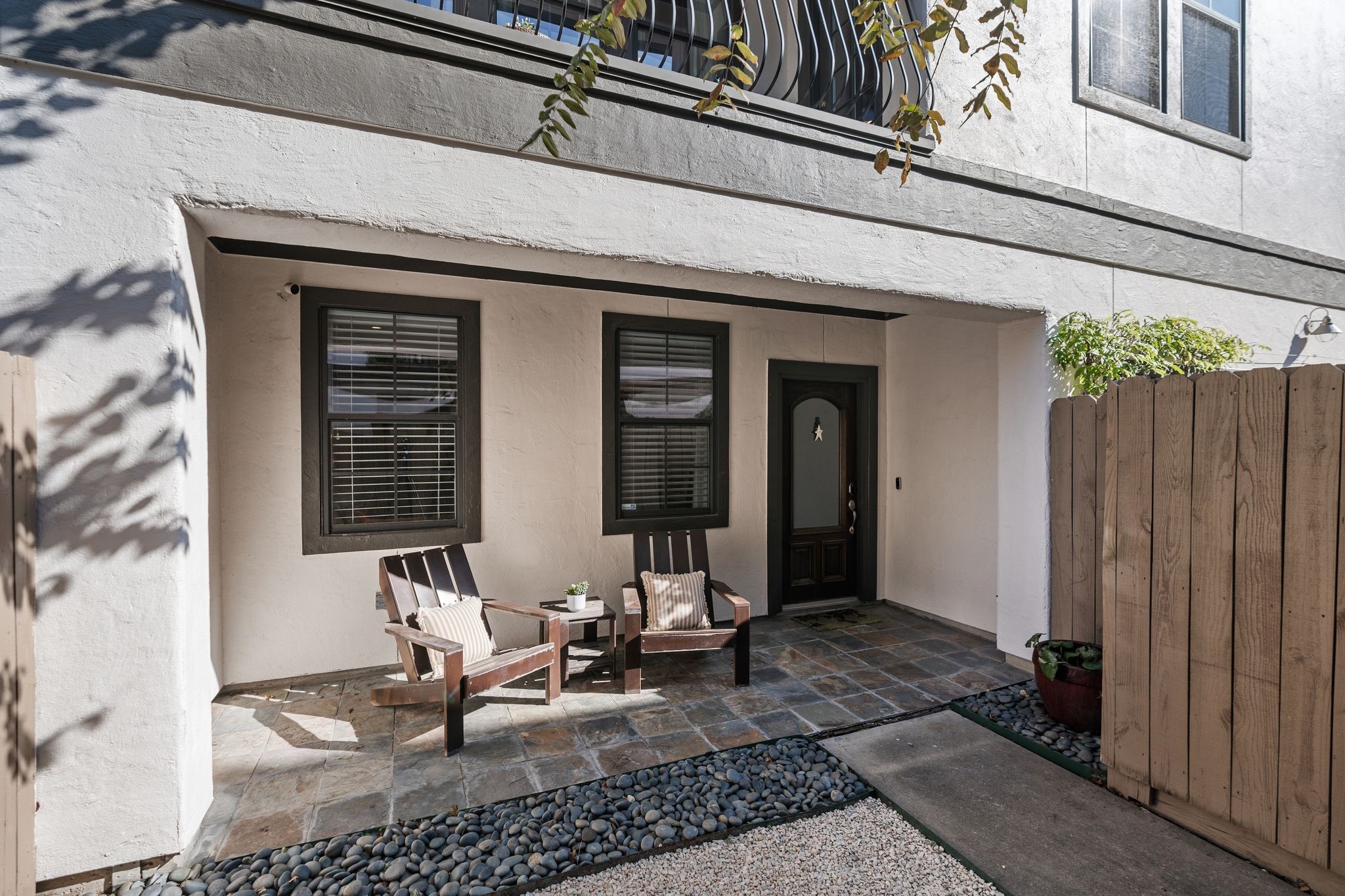 3934 Feagan Street Houston, TX 77007 - Photo 24 of 27 View of the covered patio portion of the gated front yard. Perfect for a small sitting area and easy spot to relax and keep an eye on kids/pets.