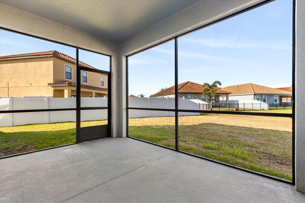 12036 Cardinal Flower Drive Riverview, FL 33579 - Photo 26 of 37 a view of an empty room with large windows