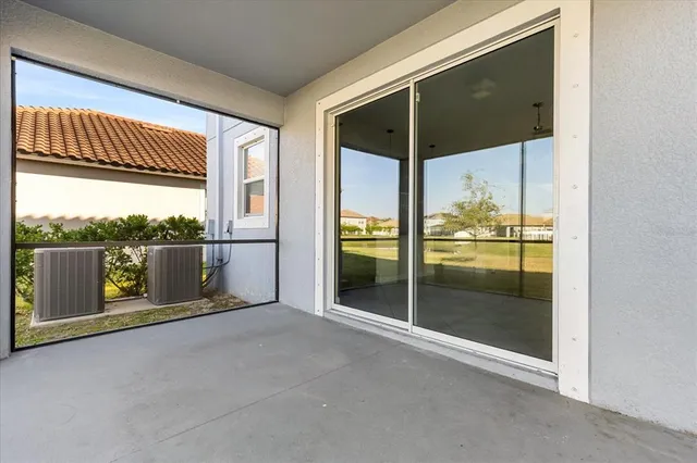 a view of a floor to ceiling window and a room