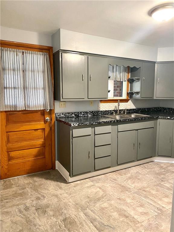 167 Fairfield Road Tarentum, PA 15084 - Photo 5 of 24 a kitchen with stainless steel appliances granite countertop a sink and a stove