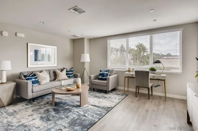 a bedroom with a bed and a table