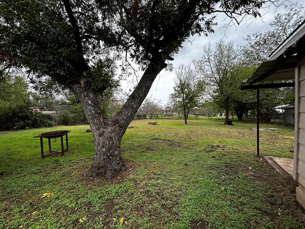 910 West Long Stephenville, TX 76401 - Photo 17 of 40 a view of outdoor space with a garden