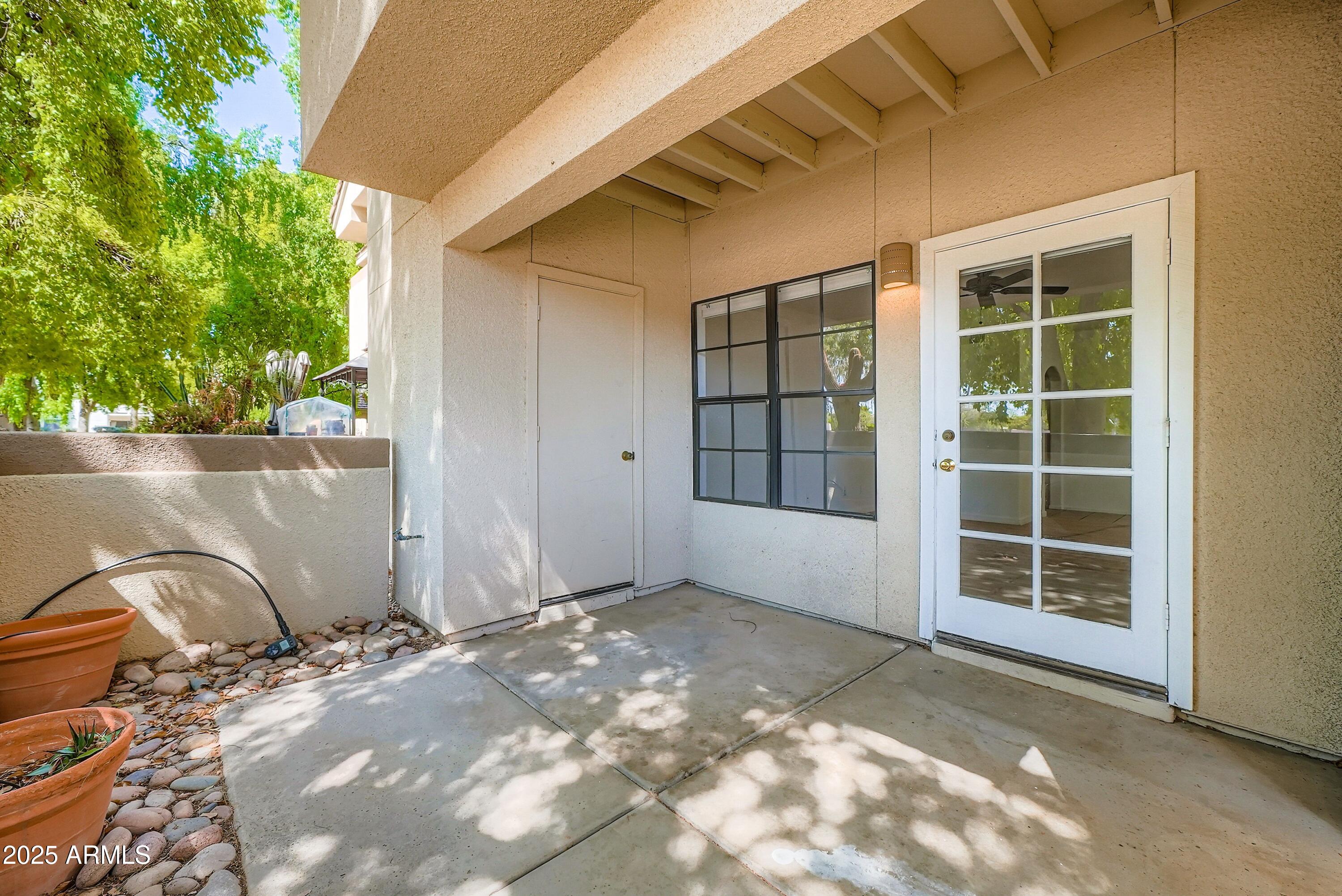 6885 East Cochise Road, Unit 105 Paradise Valley, AZ 85253 - Photo 11 of 11 a view of backyard with window