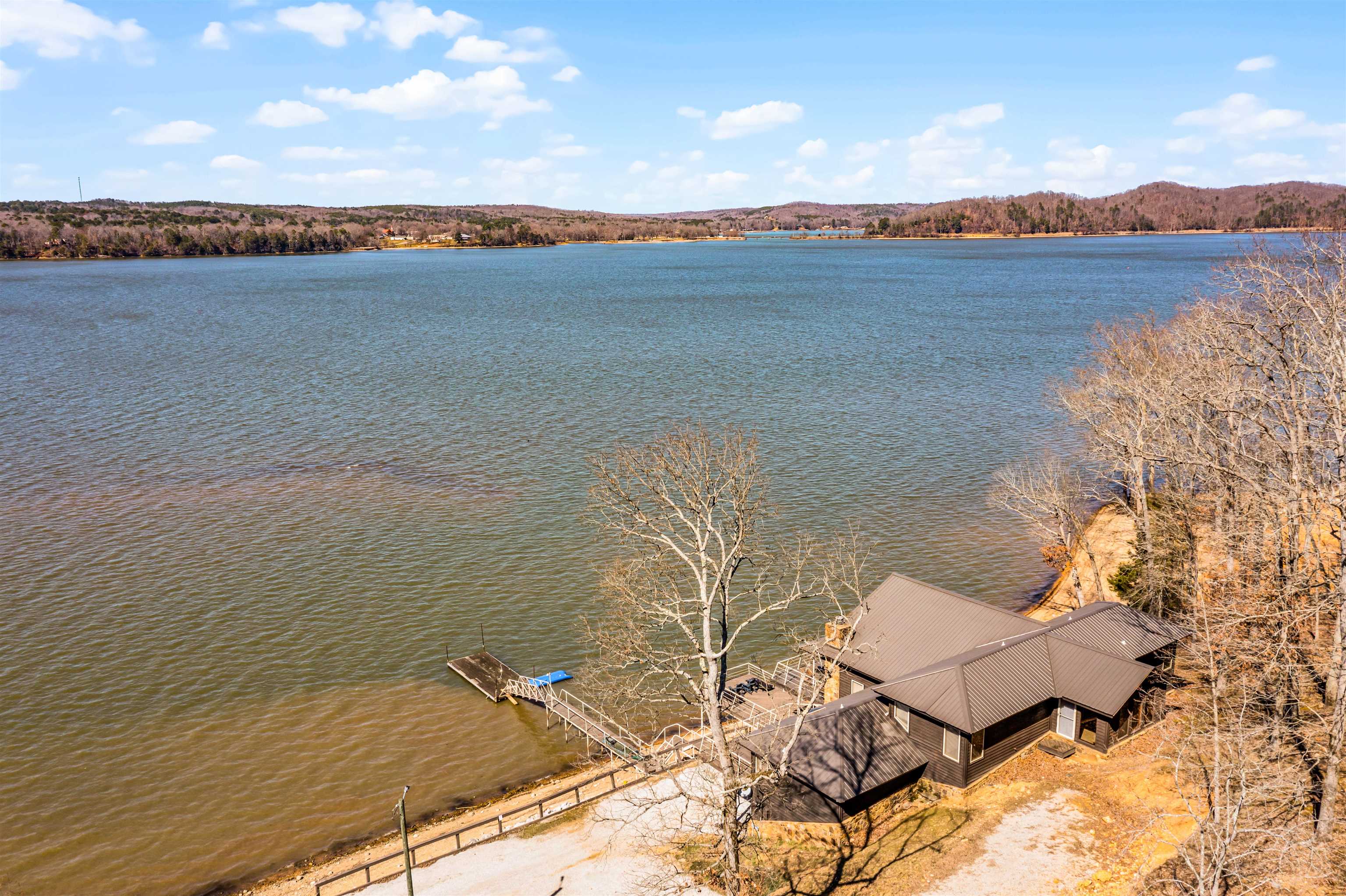 228 Chickasaw Trace Cherokee, AL 35616 - Photo 2 of 27 a view of a lake with outdoor space