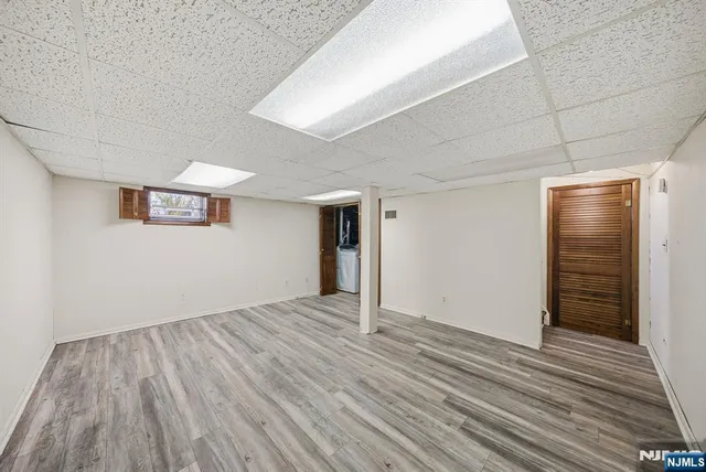 a view of a balcony with wooden floor