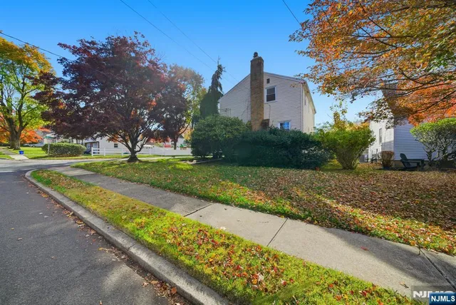 an aerial view of a house with a garden