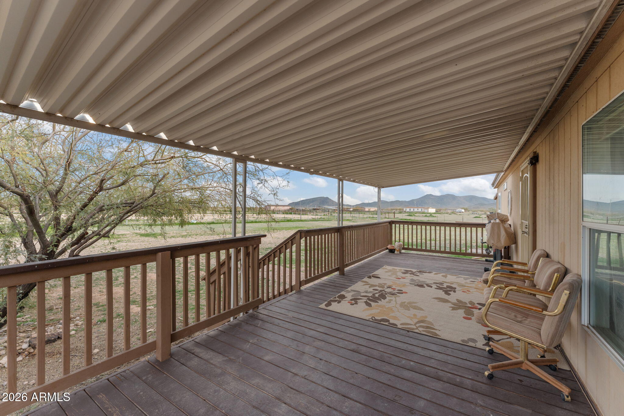 2817 Saddle Vista Road Tonopah, AZ 85354 - Photo 35 of 36 a view of a patio with wooden floor