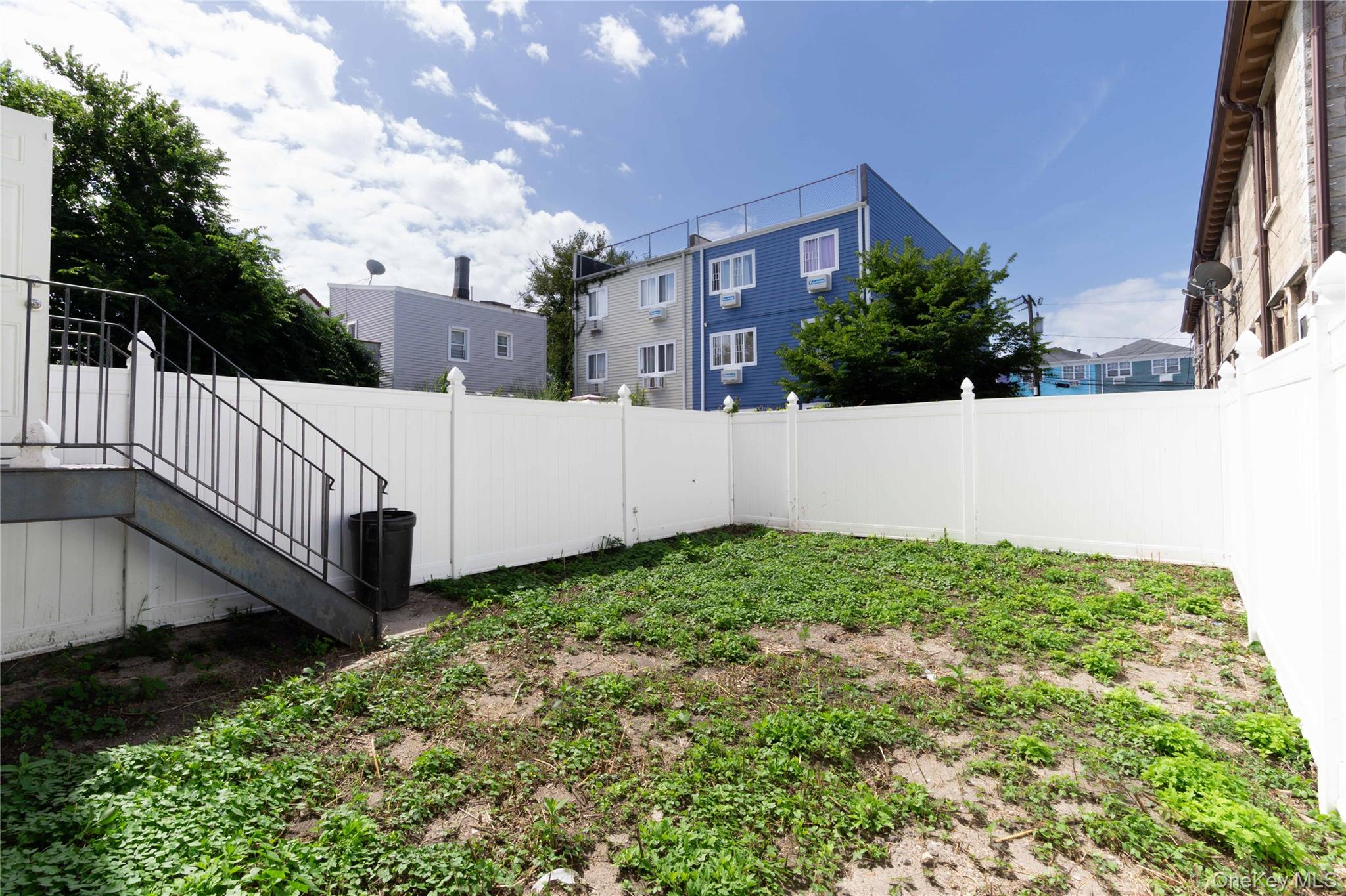 2-15 Beach 96th Street Queens, NY 11693 - Photo 38 of 39 a view of a garden with a house
