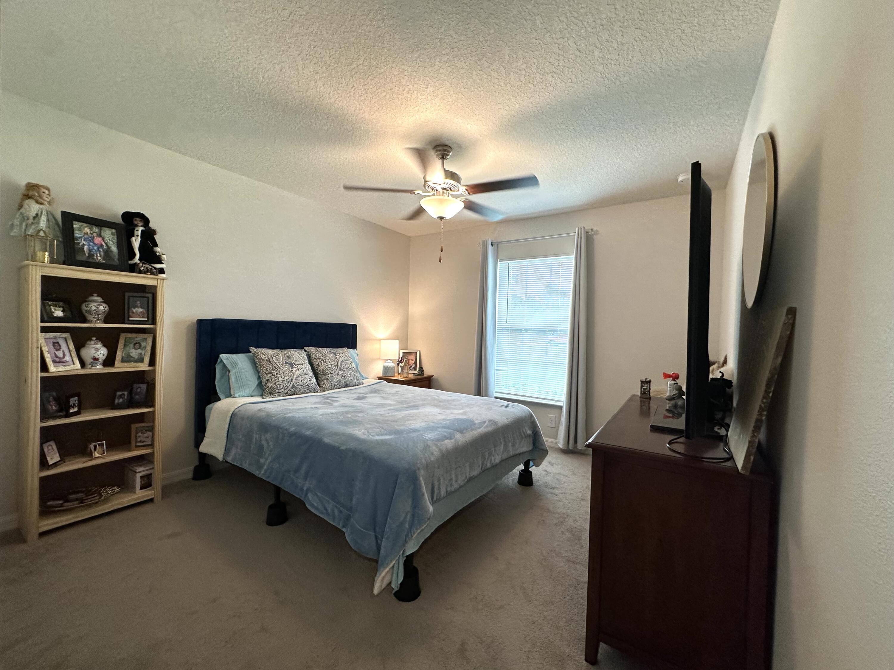 15329 Southwest 65th Ter Road Ocala, FL 34473 - Photo 13 of 28 #2 Bedroom with Ensuite Bathroom