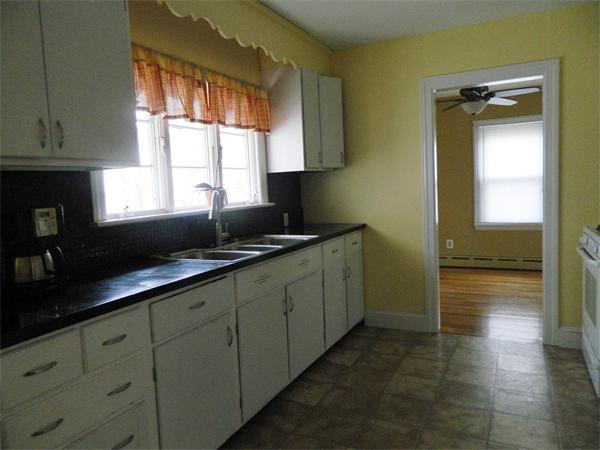 8 Girdler Road Marblehead, MA 01945 - Photo 5 of 12 a kitchen with sink cabinets and a window