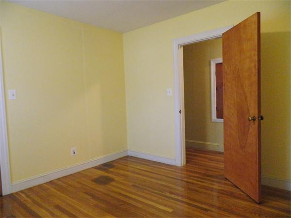 8 Girdler Road Marblehead, MA 01945 - Photo 8 of 12 a view of a small space with wooden floor and a bathroom