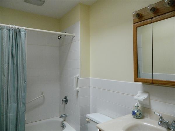 8 Girdler Road Marblehead, MA 01945 - Photo 10 of 12 a bathroom with a shower and a sink