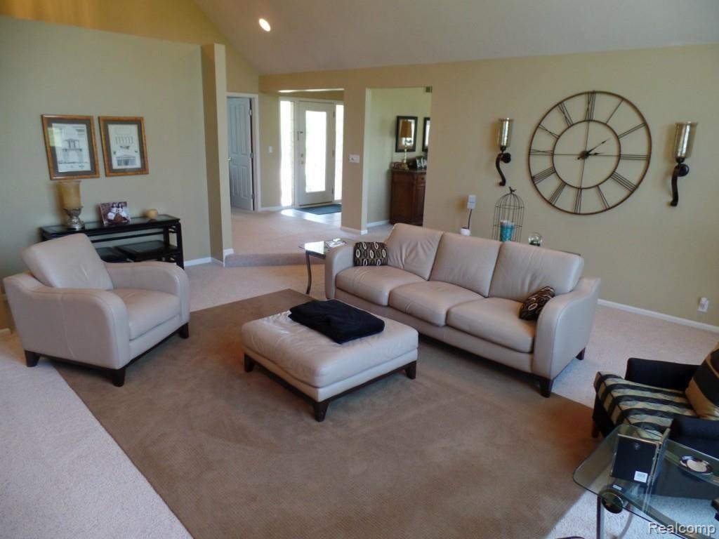 6340 Vassar Road Grand Blanc, MI 48439 - Photo 10 of 51 Another view of the formal living room, which is centrally located between the bedrooms and kitchen/dining/laundry areas.