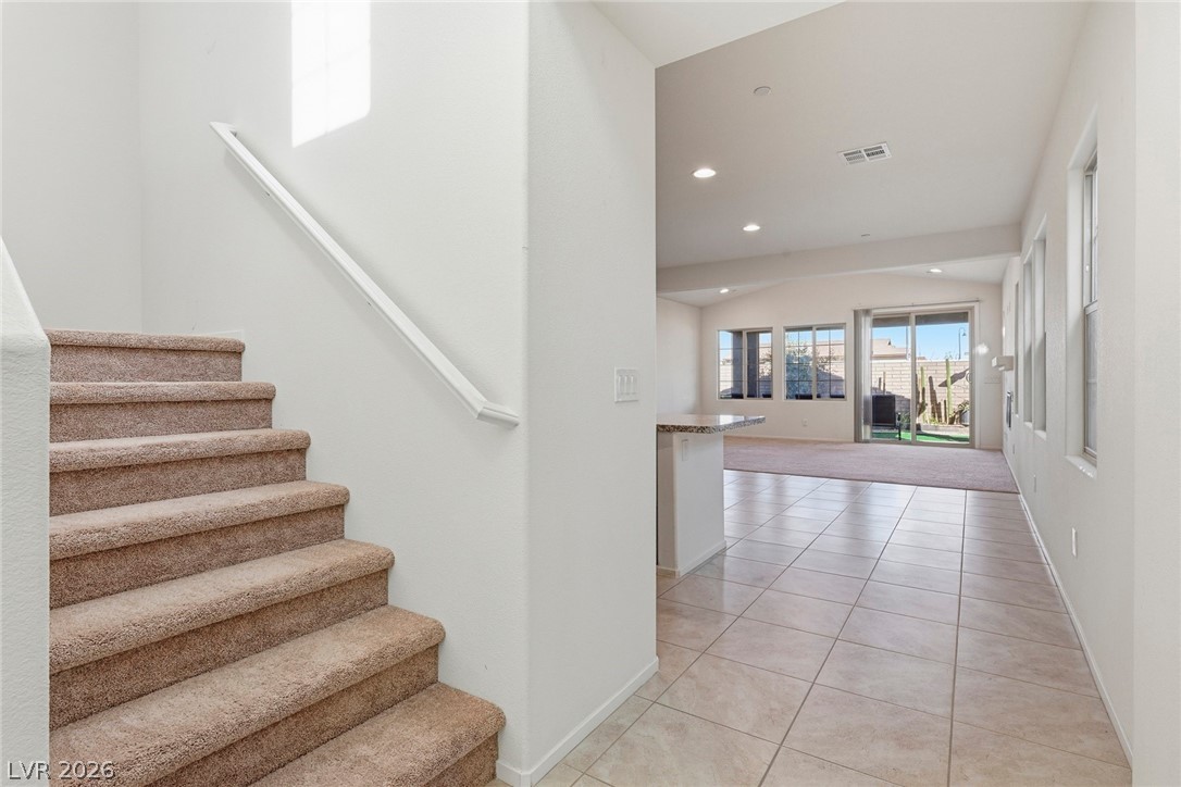 250 Dedication Avenue Henderson, NV 89011 - Photo 26 of 67 Stairs featuring tile patterned floors and recessed lighting