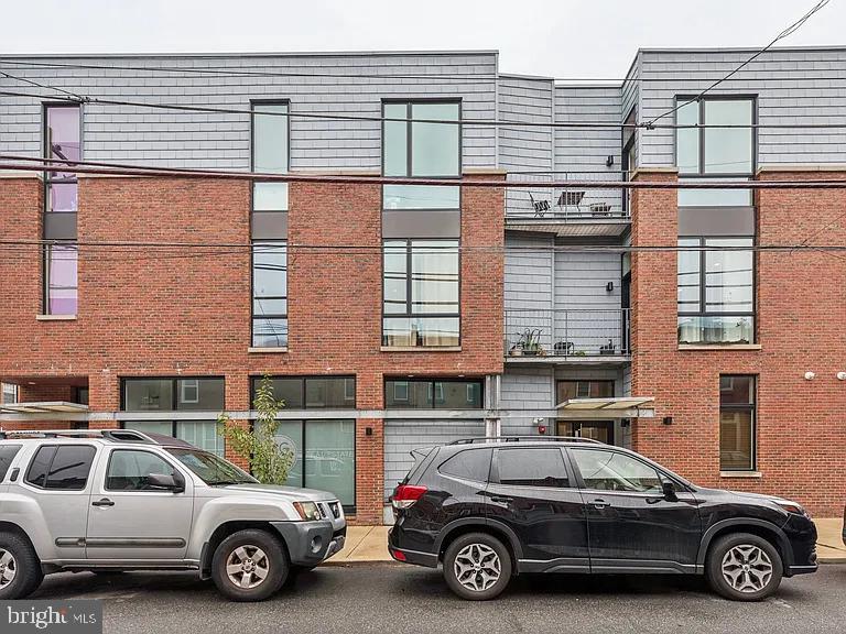 820 East Thompson Street, Unit E Philadelphia, PA 19125 - Photo 14 of 14 a view of a car in front of a house