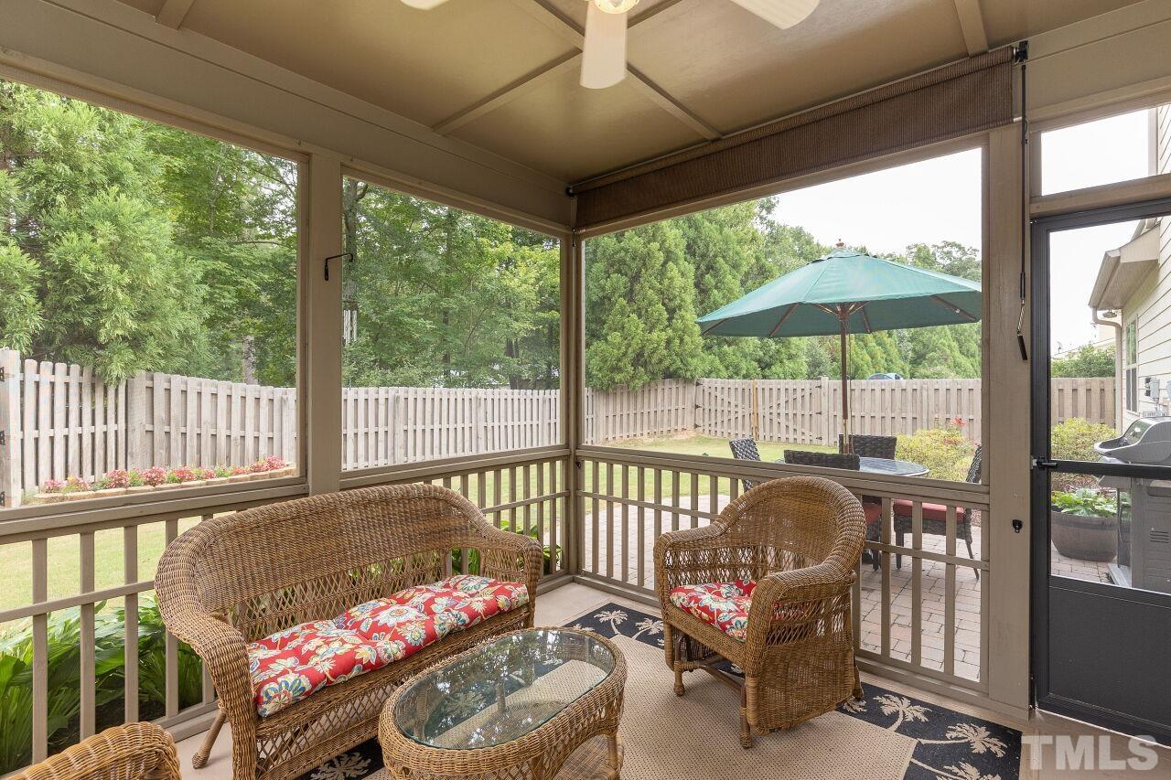 842 Wickham Ridge Road Apex, NC 27539 - Photo 36 of 43 a view of a porch with furniture