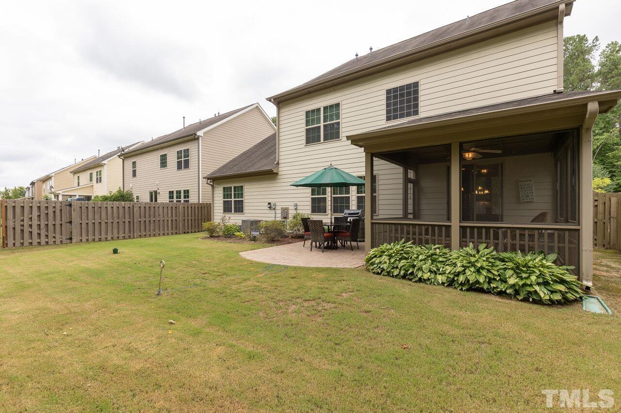 842 Wickham Ridge Road Apex, NC 27539 - Photo 40 of 43 a front view of a house with garden