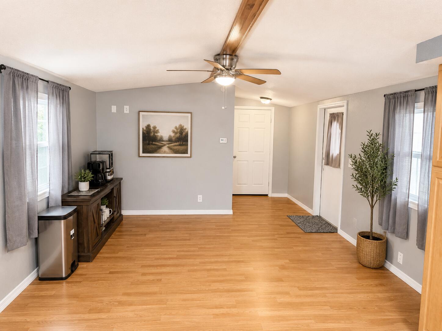 2547 Chatham Way Northeast Palm Bay, FL 32905 - Photo 17 of 24 a view of a room with wooden floor and windows