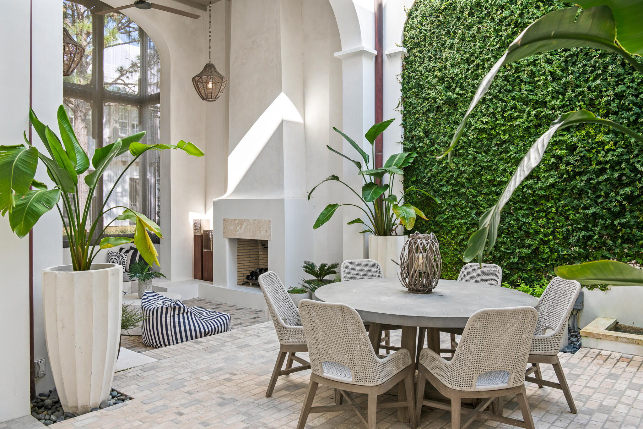 31 Sugar Loaf Alley Inlet Beach, FL 32461 - Photo 3 of 58 a view of a dining table and chairs in patio