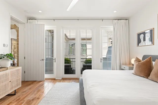 a potted plant sitting in front of a house