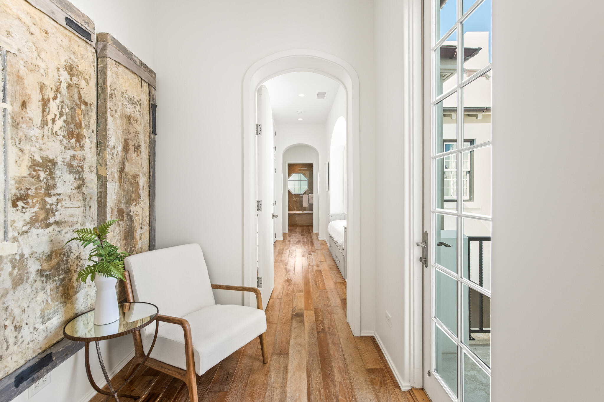 31 Sugar Loaf Alley Inlet Beach, FL 32461 - Photo 38 of 58 a view of a hallway with wooden floor and a dining room