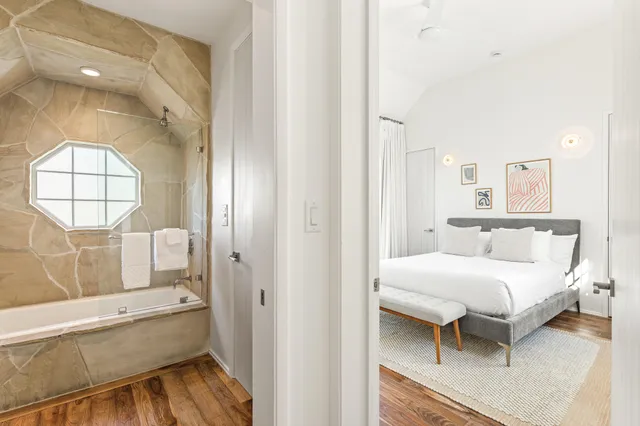 a view of a balcony with flower plants