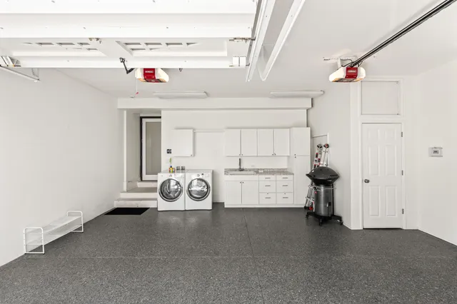 a view of a house with patio and garden