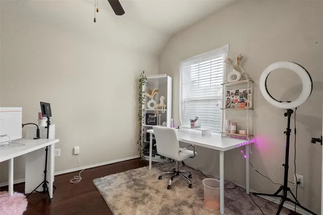 a workspace with furniture and a window