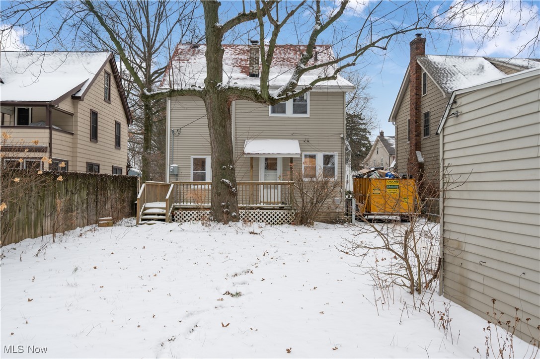 2016 Rossmoor Road Cleveland Heights, OH 44118 - Photo 43 of 46 Snow covered property featuring a chimney and a deck