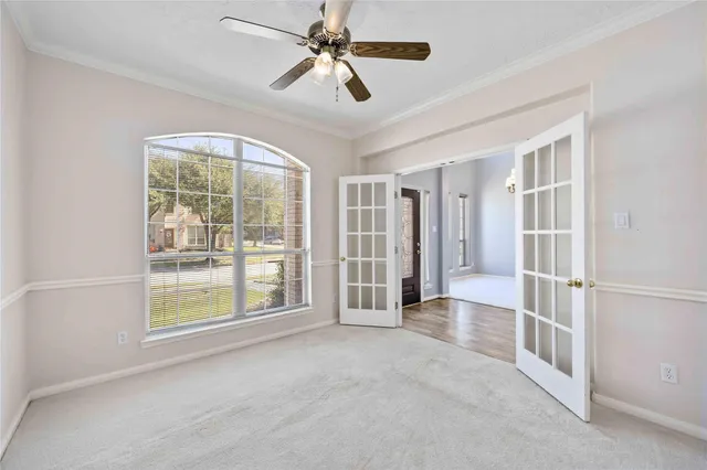 a view of livingroom with hardwood floor and ceiling fan