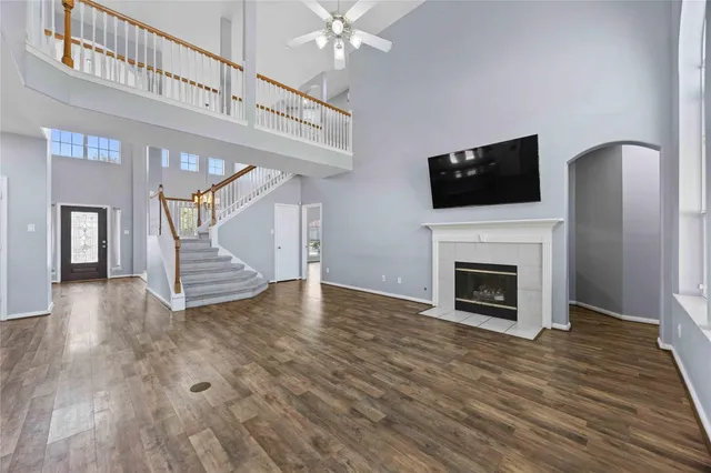 a view of livingroom with wooden floor and fireplace
