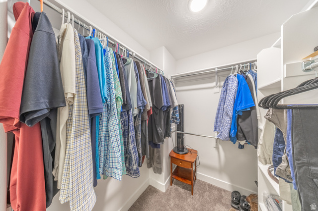 4765 Breezy Patch Road Eagle Mountain, UT 84005 - Photo 19 of 25 Integrated closet system featuring white shelving and hanging rods