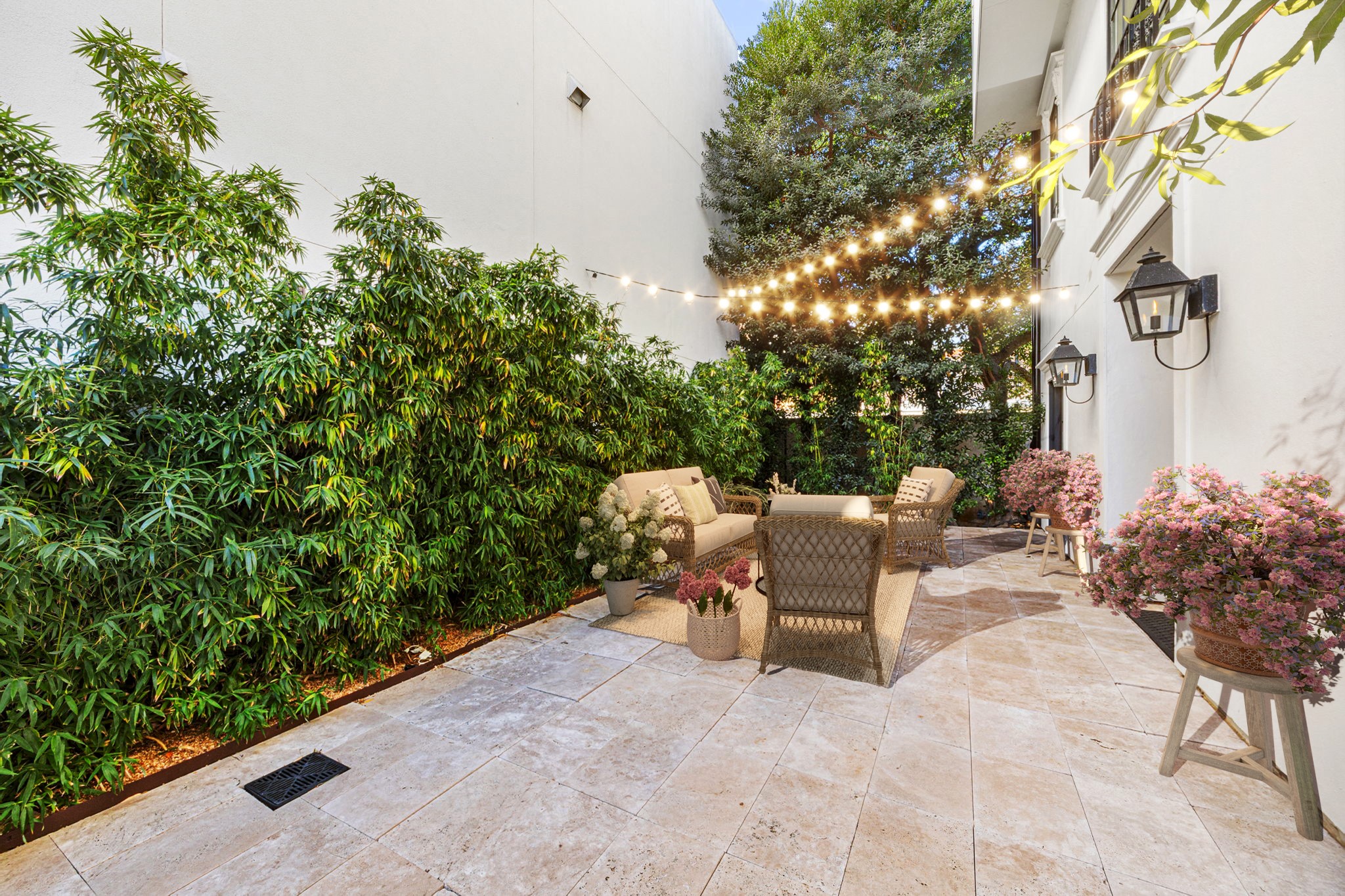 1723 Sunset Boulevard Houston, TX 77005 - Photo 3 of 50 a view of a patio with table and chairs and potted plants