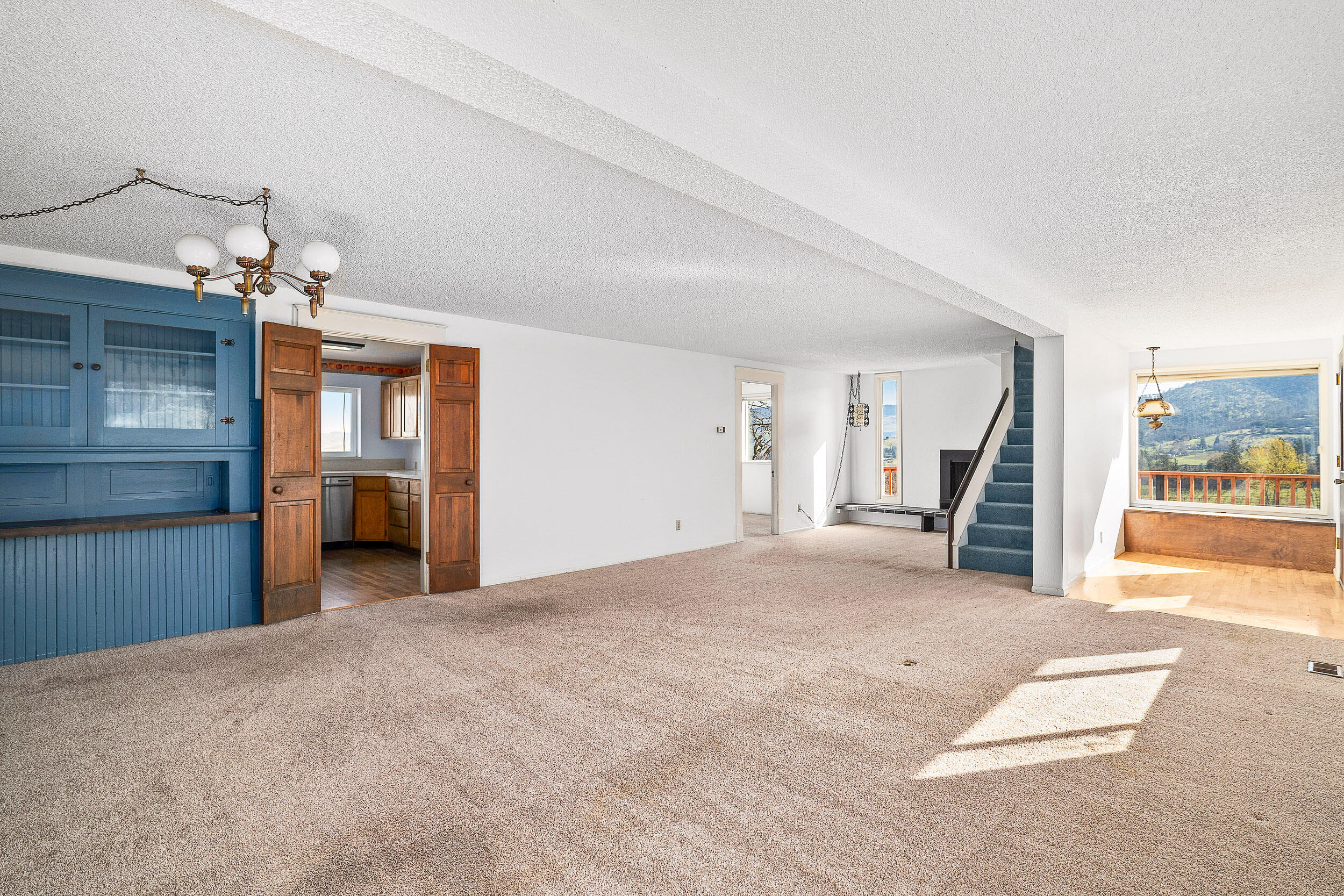 1000 Morey Road Talent, OR 97540 - Photo 17 of 48 a view of a livingroom with wooden floor and stairs