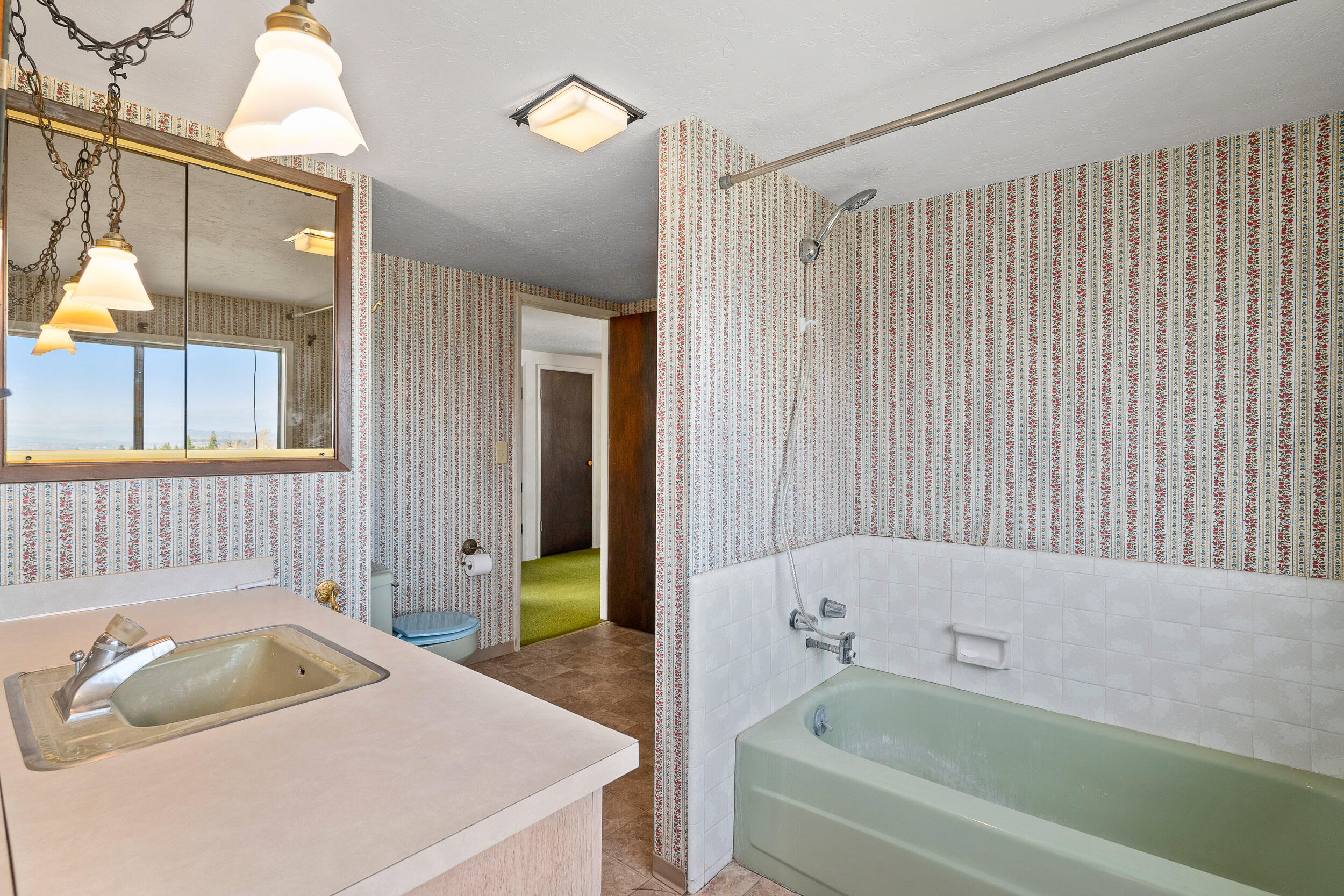 1000 Morey Road Talent, OR 97540 - Photo 32 of 48 a bathroom with a tub a sink and a window
