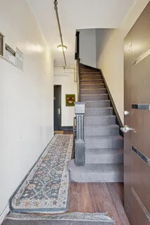 a picture of a room with a white wall and a white wall