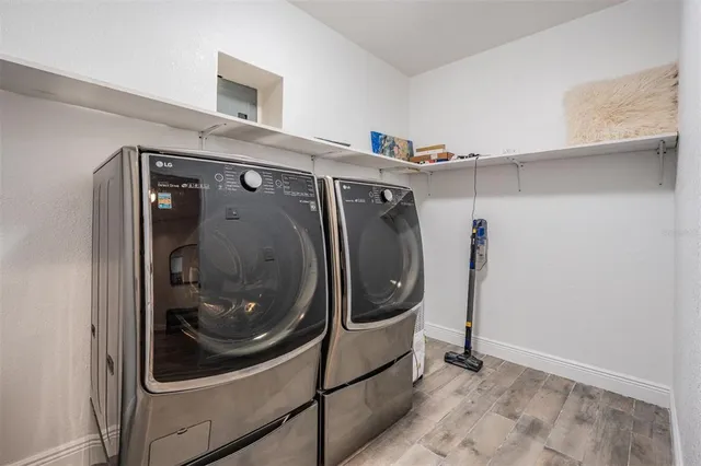a utility room with dryer and washer