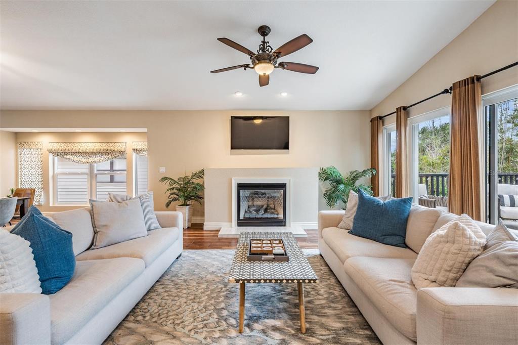 118 10th Avenue North Indian Rocks Beach, FL 33785 - Photo 7 of 31 a living room with furniture fireplace and window