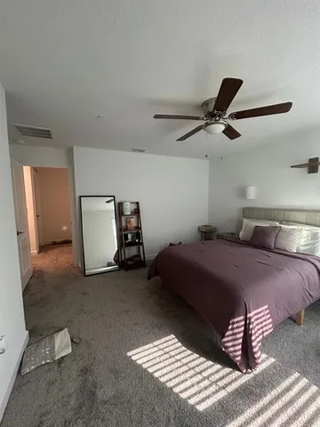 a kitchen with sink refrigerator and stove