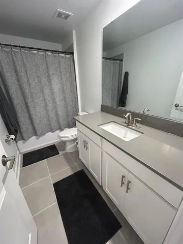 a view of a garden with a fountain