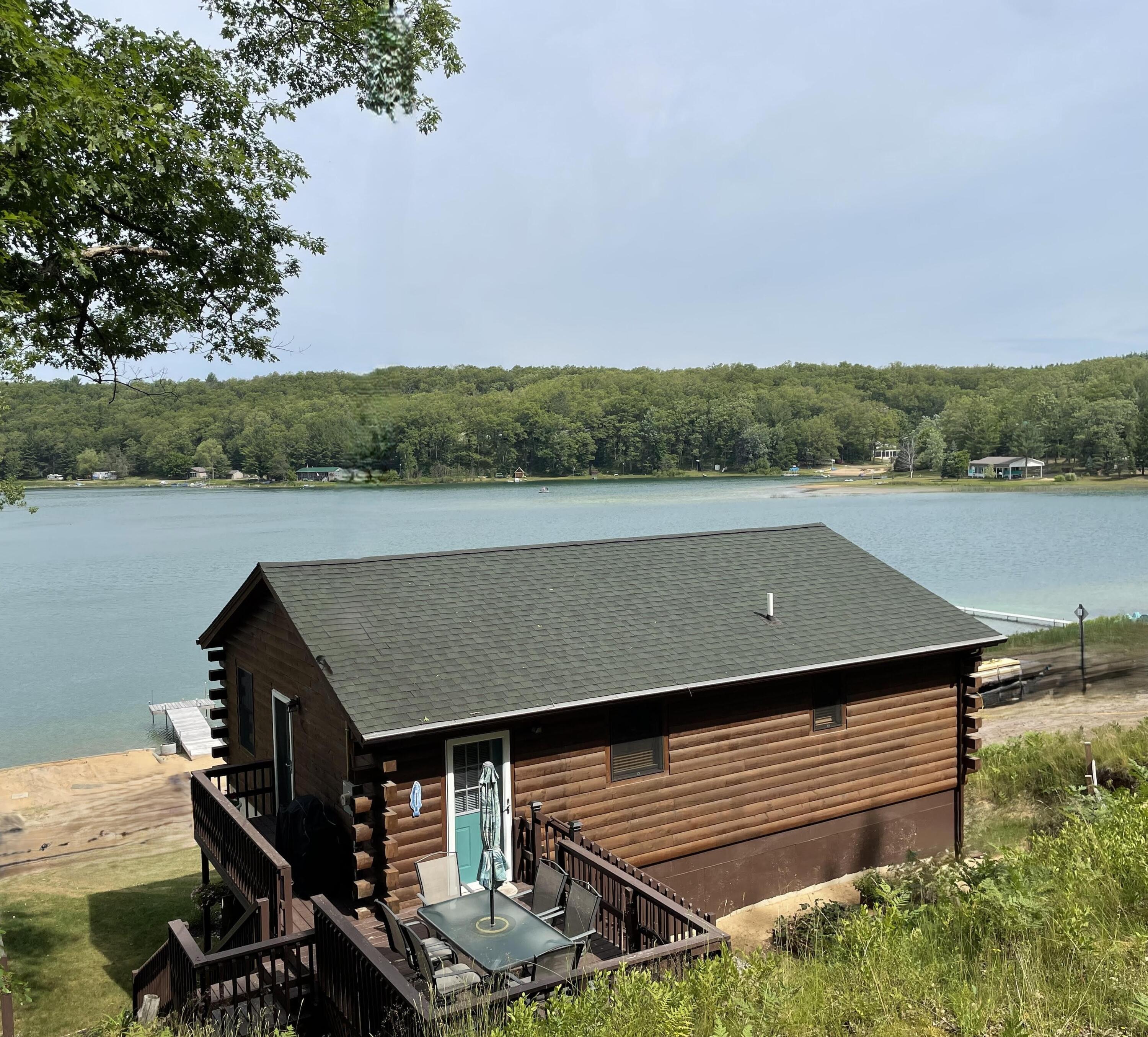 4440 South Nugent View Lane Baldwin, MI 49304 - Photo 2 of 44 Back of house on hill