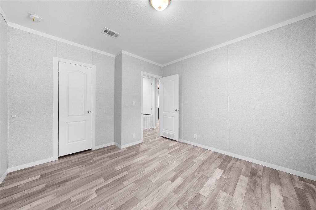 109 3900th Road Gilmer, TX 75644 - Photo 24 of 35 a view of an empty room with wooden floor