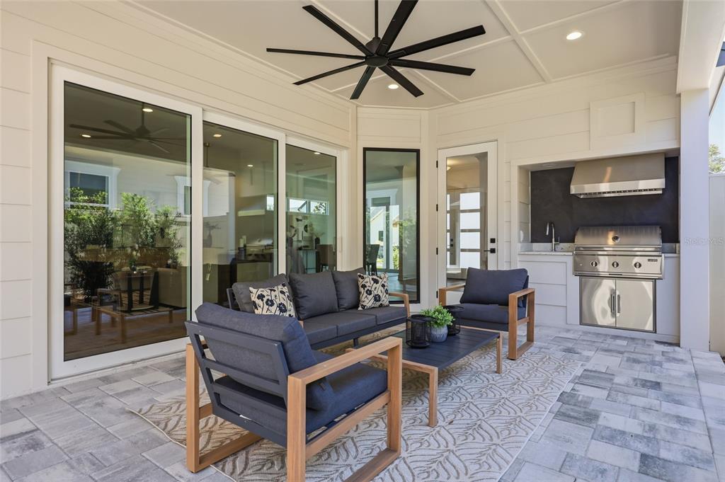 1063 Southwest 135th Way Newberry, FL 32669 - Photo 9 of 42 a living room with furniture a large window and a fireplace