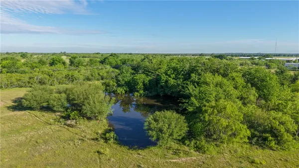 a view of a green field with lots of green space