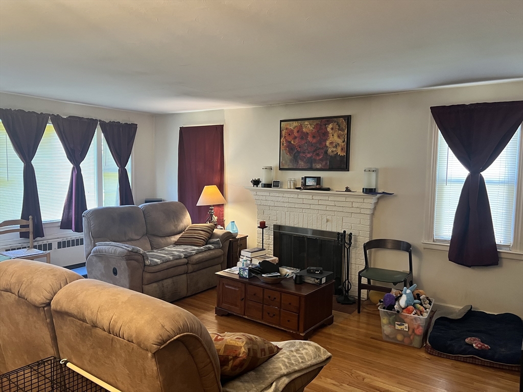 37 Ashmore Road Worcester, MA 01602 - Photo 5 of 5 a living room with furniture fireplace and a window